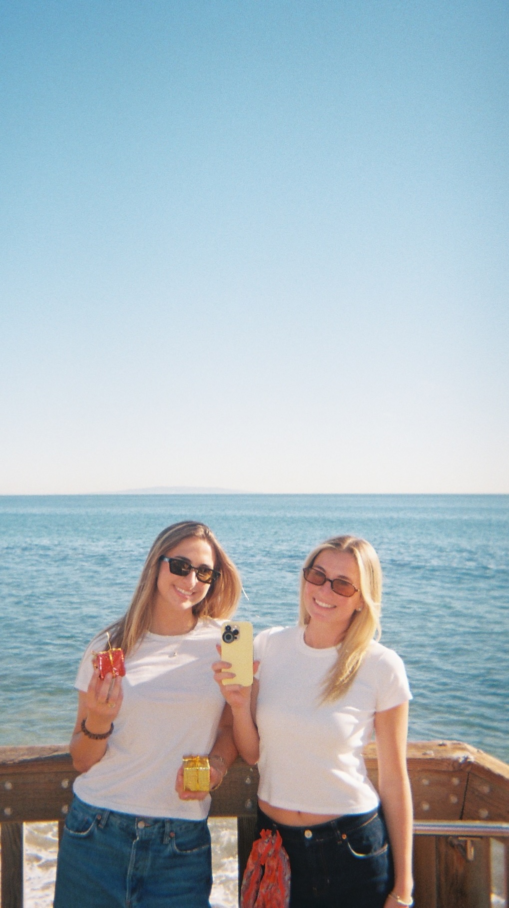 Couple enjoying a moment on the beach captured with LoTime film style lens